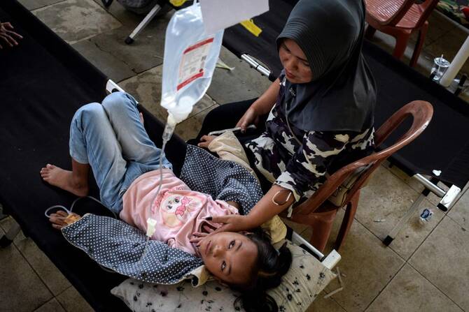 Indonesia free meals program under fire after thousands sickened