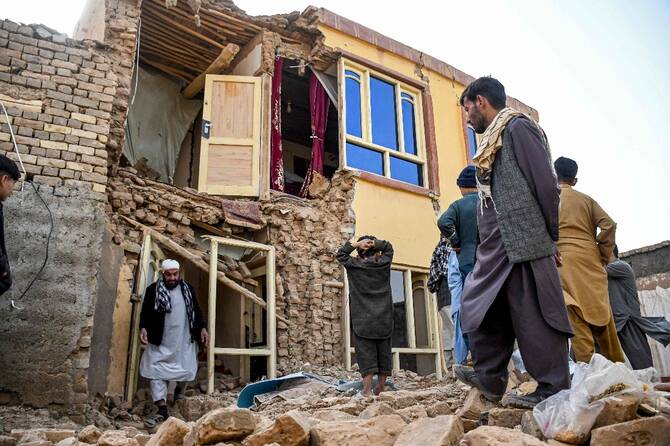 Afghanistan earthquake survivors face cold and rain amid rubble