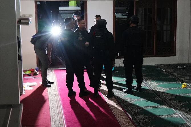 Indonesia probes student after nearly 100 hurt in school blasts