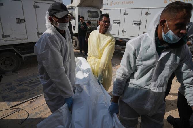 Israel returns bodies of 15 Palestinians after militants return remains of an Israeli hostage