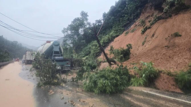 Heavy rain triggers landslides and floods in central Vietnam, killing seven