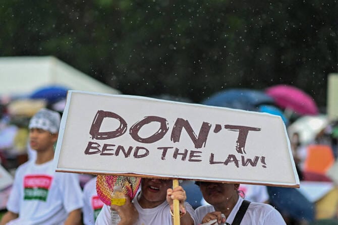 Thousands of anti-graft protesters take to streets of Philippines capital for second day