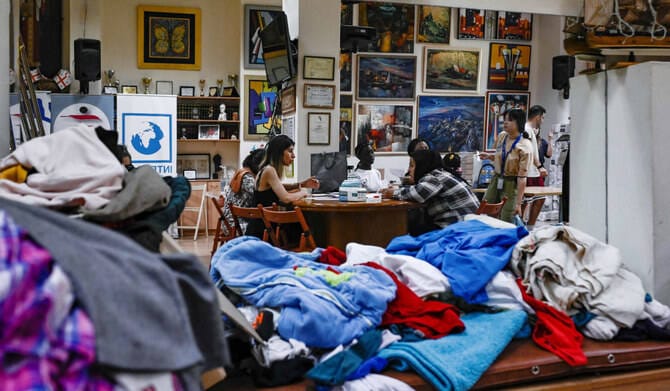 Riot at Greek migrant detention center leaves 2 police injured, 30 migrants arrested