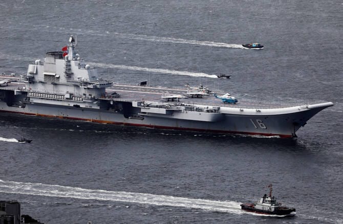 Chinese carrier conducting intense air operations near Japan, Tokyo says