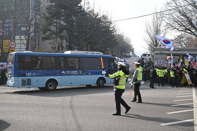 A South Korean court sentences Yoon to 5 years in prison on charges related to martial law decree