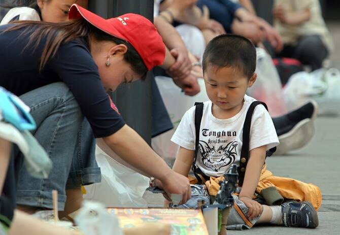 China’s birth rate falls to lowest on record: official data